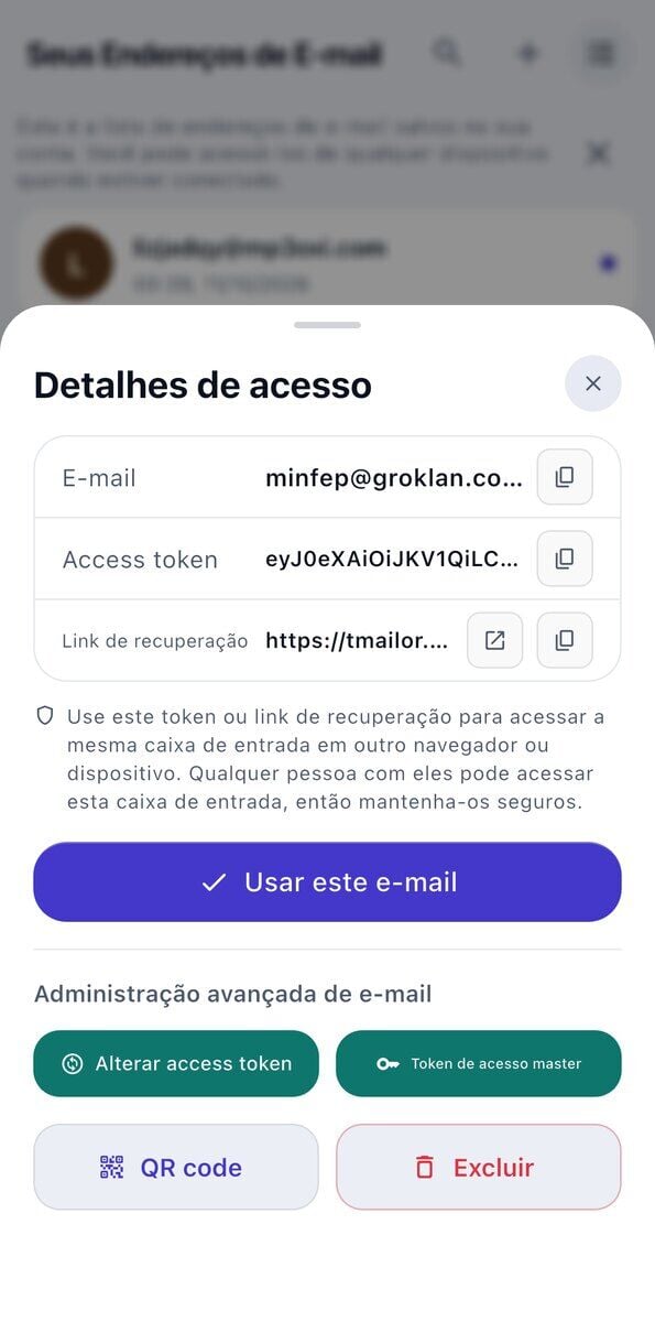 A folha Detalhes de acesso no iOS mostrando o endereço de e-mail o Token de acesso o Link de recuperação um aviso para guardá-los em segurança e o botão Usar este endereço de e-mail