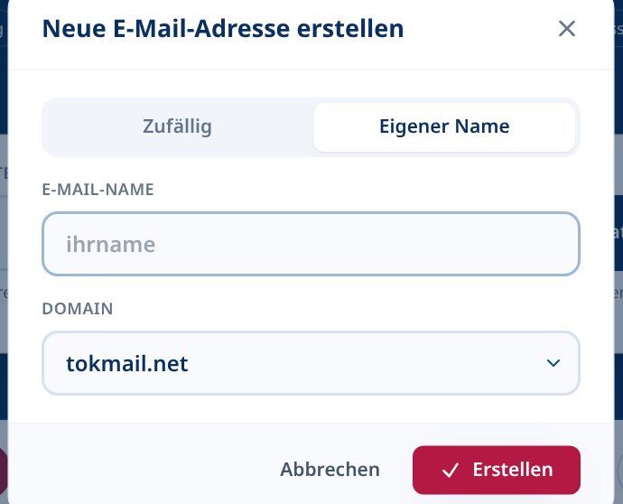 Tmailor erstellen Sie einen neuen E-Mail-Adress-Dialog im Reiter Benutzerdefinierter Name mit einem E-Mail-Namen-Feld und einem Domain-Dropdown-Menü