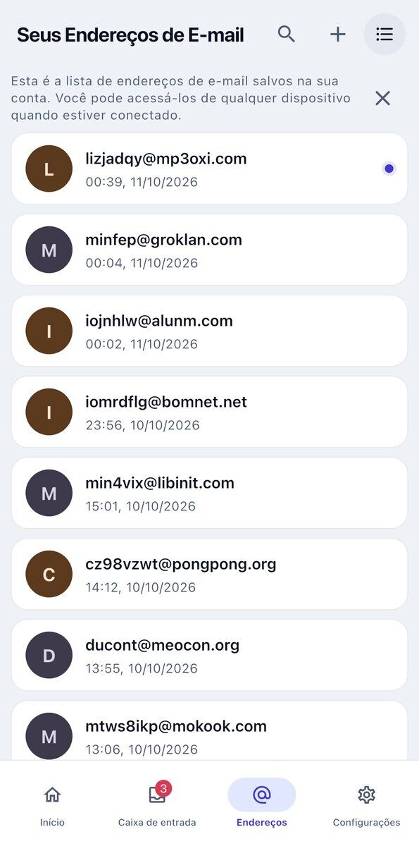 A tela Seus Endereços de E-mail no iOS mostra caixas de entrada temporárias salvas com a data e hora de cada uma criada além dos botões de busca e adicionar no cabeçalho