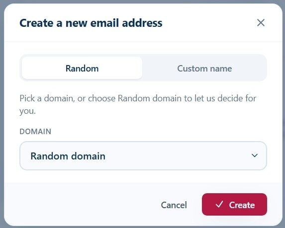 Tmailor Create a new email address dialog with the Random tab selected and a Random domain dropdown
