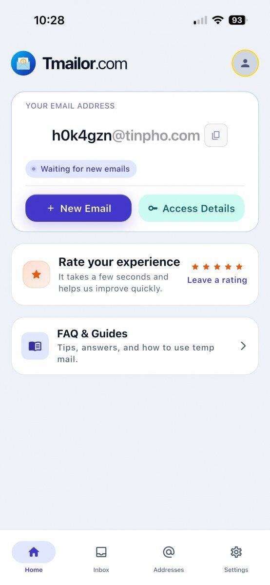 iPhone showing the Tmailor home screen with a disposable email address New Email and Access Details buttons