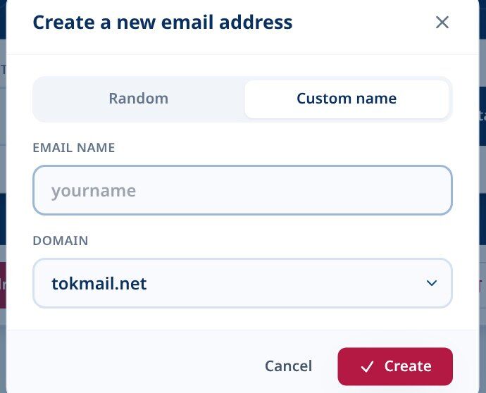 Tmailor Create a new email address dialog on the Custom name tab with an Email name field and a Domain dropdown